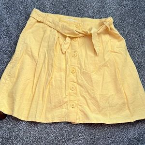 Yellow belted skirt with buttons